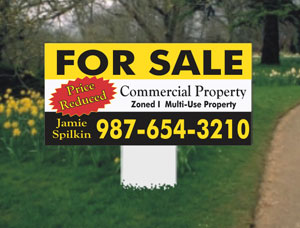 small real estate property signs